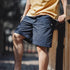Retro waterproof outdoor shorts with big pocket, casual summer style in navy blue.
